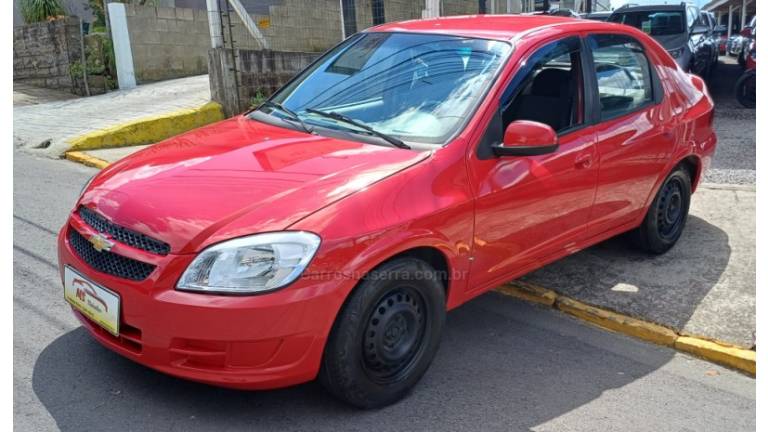 CHEVROLET - PRISMA - 2012/2012 - Vermelha - R$ 24.000,00