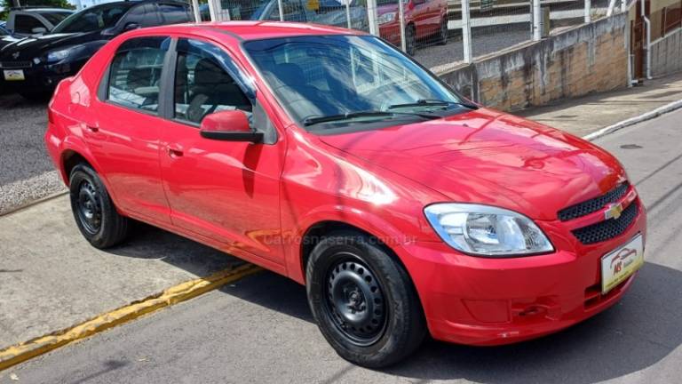 CHEVROLET - PRISMA - 2012/2012 - Vermelha - R$ 24.000,00